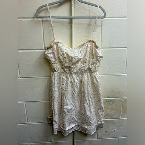 Woman’s free people large white and purple blossoms sleeveless mini dress